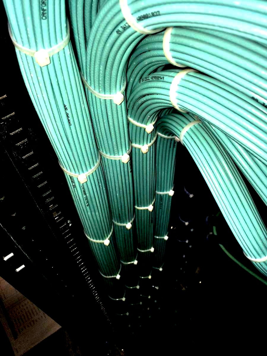 Broadcast cable installation with neatly bundled cables in a rack